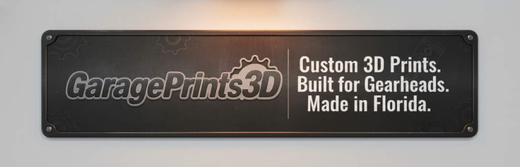 GaragePrints3D sign with branding and text on a gray background